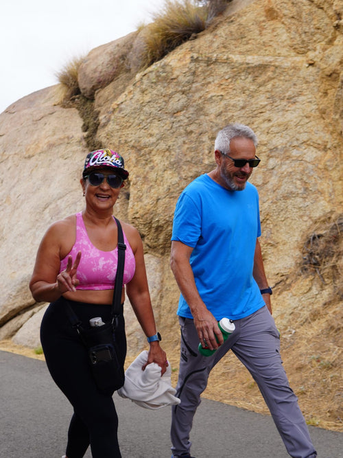 Elevate members walking a ridgeline together